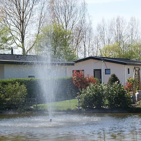 Modern With A Fireplace In A Noord-Scharwoude